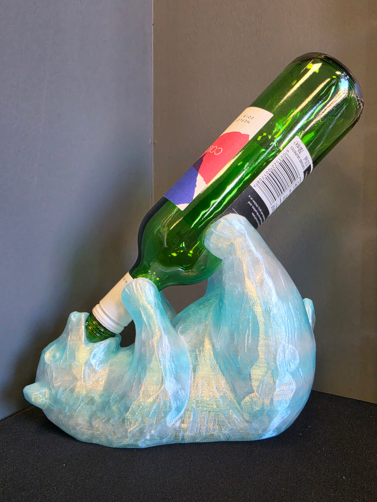 Boozy Bear PETG wine bottle holder displaying a green wine bottle