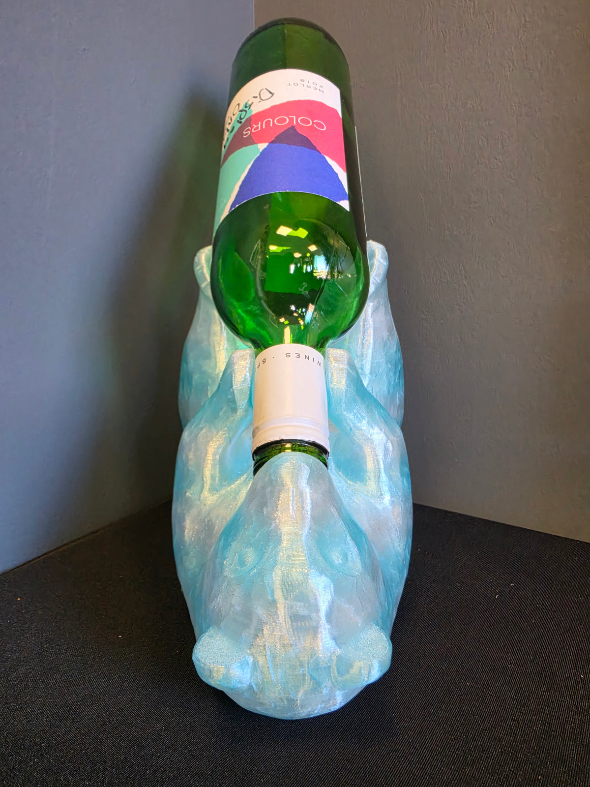 Boozy Bear PETG wine bottle holder displaying a green wine bottle